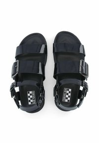 Sandales en plastique noir avec deux larges brides et boucles réglables. Caractérisées par une semelle texturée et une semelle intérieure de marque avec un motif à carreaux.