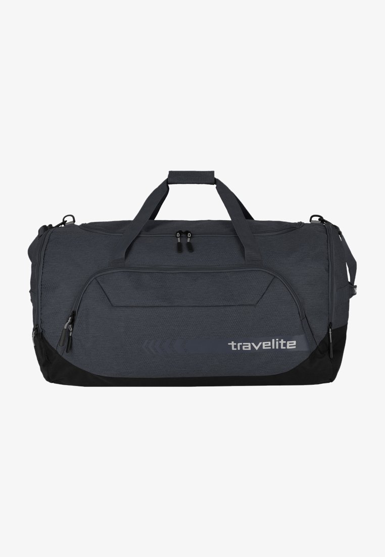 Graue Reisetasche aus Duffel mit schwarzem Boden, ausgestattet mit zwei oberen Griffen, Reißverschlüssen und einem Logo. Strukturiertes Gewebe mit einem eleganten Design.
