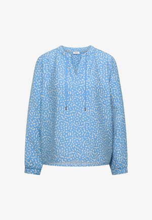 Světlomodrá blůza s dlouhým rukávem, bílými abstraktními skvrnami, výstřihem do V a šňůrkami na zavazování u výstřihu.