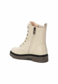 XTI Botines con cordones - beige