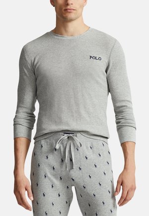 Grey ribbed long-sleeve shirt with "POLO" embroidered in navy. Paired with light grey pants featuring scattered navy polo player logos.