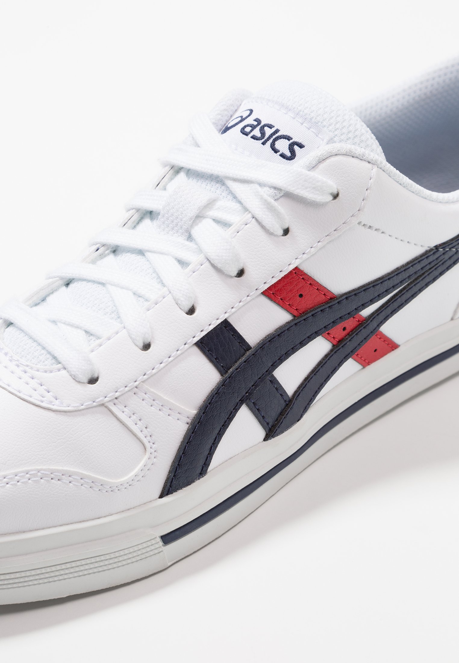 asics aaron trainers