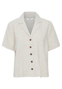 Beige lyhythihainen nappikauluspaita, jossa on viisi ruskeaa nappia ja teksturoitu kangas. Yksinkertainen, väljästi istuva muotoilu.