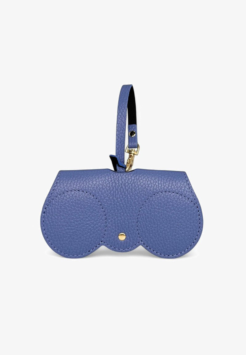 Sac en cuir bleu au design arrondi, comportant deux compartiments ronds et un fermoir à pression doré. Inclut une bandoulière pour un transport facile.