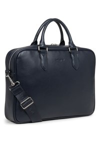 Dark navy leather laptop bag with dual top handles, detachable shoulder strap, and silver hardware. Smooth, textured exterior with zipper closure.