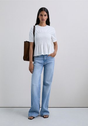 Scalpers T-shirt con stampa - off white