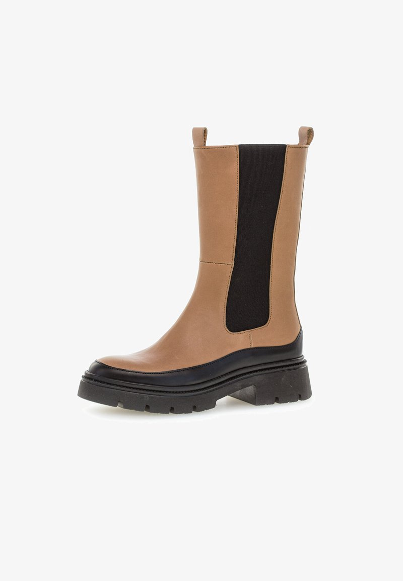 Tan leren enkellaarzen met zwarte elastische zijpanelen, rubberen zool en een stevige hak. Heeft een gladde textuur en een rond toelont.