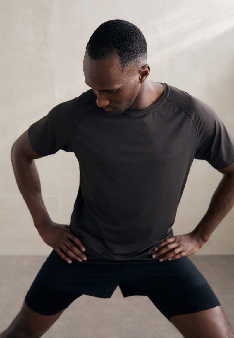 ICANIWILL STRIDE RAGLAN - Sportfelső - charcoal