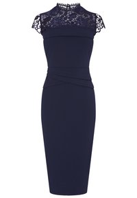 Tummansininen, istuva mekko, jossa on pitsikupu, hihattomat hihat ja korkea kaula-aukko. Rypytetty kangas, jossa on rypytetty yksityiskohta vyötäröllä.