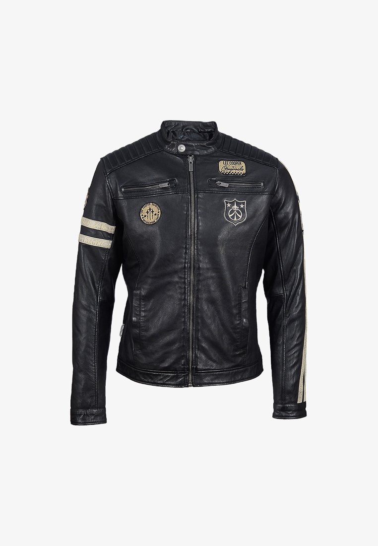Zwarte leren jas met ritszakken, schouderpadding en decoratieve patches. Accenten met beige strepen op de mouwen.