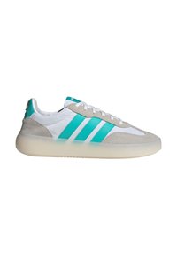 Sneaker with a white leather upper, grey suede toe, and teal synthetic stripes. Features a translucent rubber sole and lace closure.
