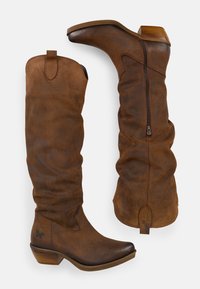 Stivali al ginocchio in pelle marrone con design morbido, zip laterale, punta rotonda e tacco in legno impilato.