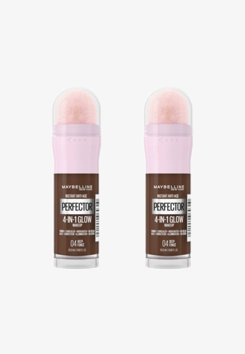 Maybelline Instant Anti-Age Perfector 4-en-1 Glow maquillage en Deep Forge. Tubes doubles avec des bouchons roses ; applicateurs en éponge en haut.