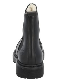 Stivale alla caviglia in pelle nera con finitura liscia, punta rotonda, pannelli laterali elastici e suola in gomma testurizzata. Fodera in shearling visibile.