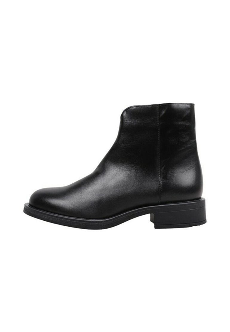 Black leather ankle boot with a smooth finish, rounded toe, and low stacked heel. Seamless design with no visible hardware or accents.