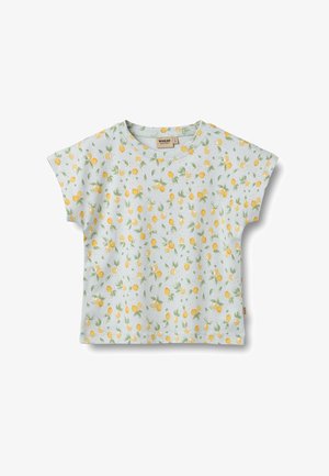 Witte korte mouw peutershirt met een patroon van gele citroenen en groene bladeren over het hele oppervlak.