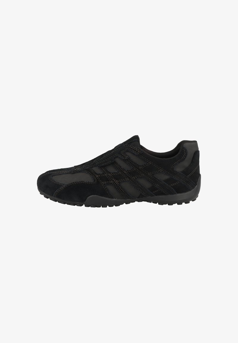 Black athletic shoes featuring a suede upper with mesh panels, curved shape, textured sole, and contrasting stitching details.