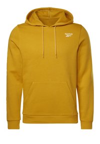 Sweat à capuche jaune Reebok en tissu doux, doté d'une poche avant, d'une capuche avec cordon réglable et d'un logo imprimé sur la poitrine.