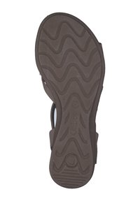 Bruine rubberen sandaalsole met een zigzagtextuur. Bevat het merkteken "Gabor" en een zichtbaar loopvlakpatroon voor grip. Gladde randen en contourede vorm.