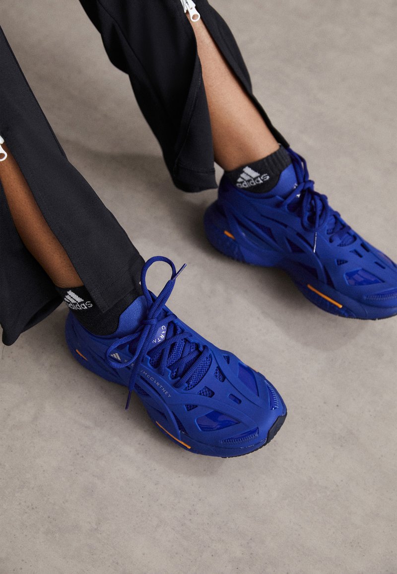 adidas by Stella McCartney SOLAR GLIDE - Road running shoes - mystery ink/crew orange