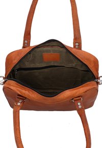 Brown leather handbag with two handles, open top zipper showing dark fabric interior and a zippered inner pocket.