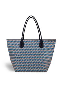 Taška cez rameno so vzorom s geometrickým dizajnom v modrej, hrdzavej a béžovej farbe, s tmavomodrými uchami a textúrovanými akcentmi.