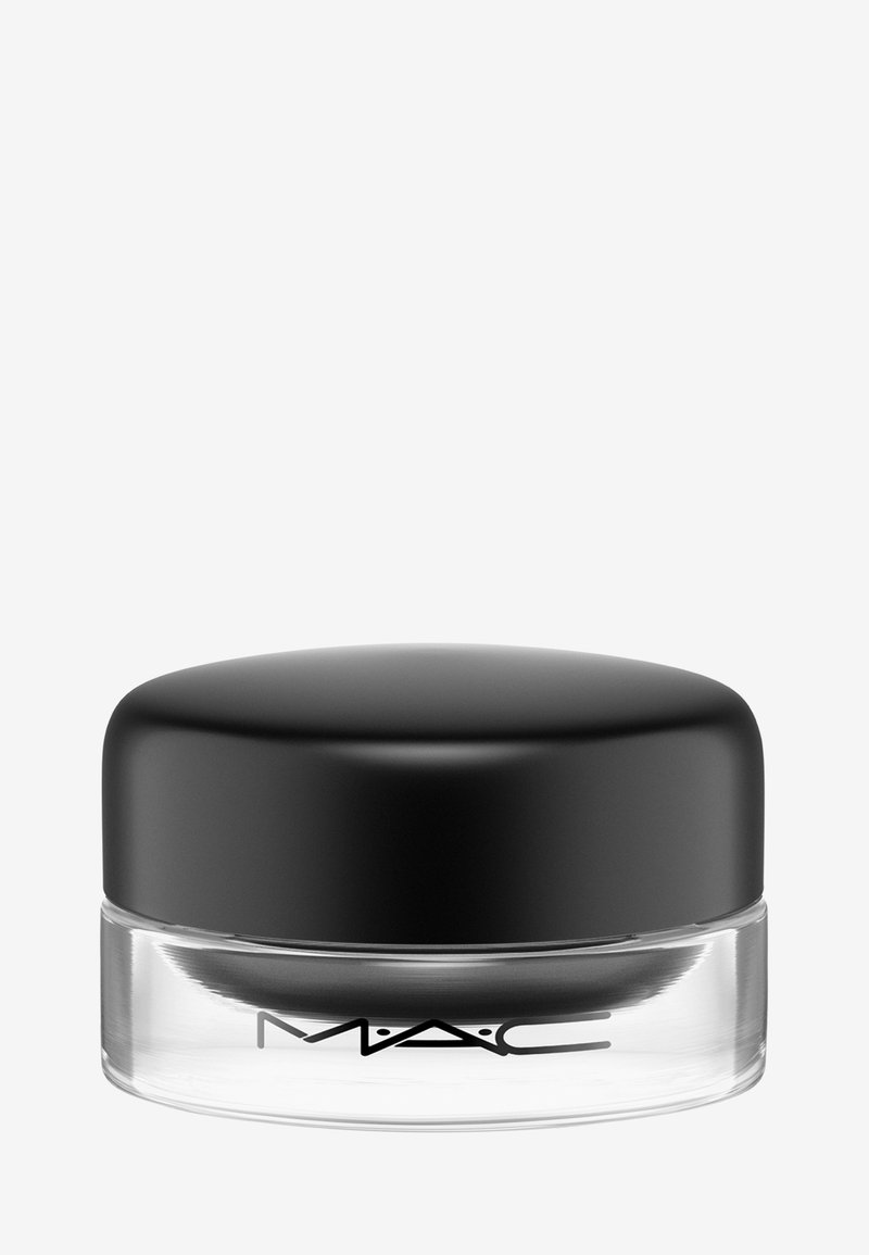Zwarte crèmeye schaduw in een heldere glazen pot met een afgeronde zwarte deksel; de pot heeft een MAC-logo op de voorkant.