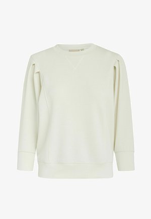 Sudadera beige clara con mangas largas, hombros caídos y puños acanalados. Presenta un cuello redondo y detalles de costura sutiles en los hombros.