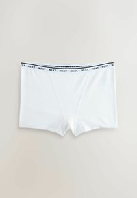 Boxer blanc pour homme avec une ceinture élastique noire et blanche affichant la marque "NEXT" en répétition, posé à plat sur une surface claire.