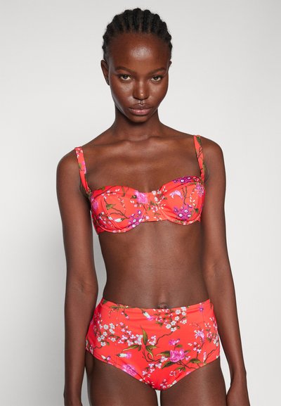 Red floral bikini set featuring a balconette top with adjustable straps and high-waisted bottoms, adorned with various flower patterns.