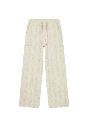 Pantalon ample couleur crème avec des rayures texturées verticales, taille élastique avec cordon de serrage, doté de poches latérales.