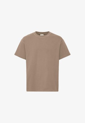 T-shirt en coton beige à manches courtes avec un col rond et une coupe décontractée, présentant un design simple et une texture douce. Aucun graphisme ni accent.