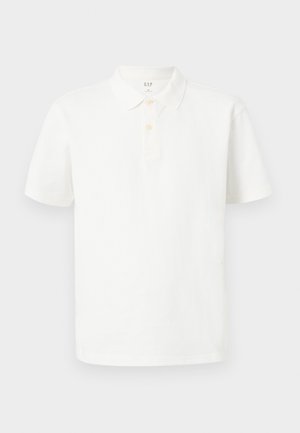 Vit polo t-shirt i bomull med klassisk krage, korta ärmar, tvåknapps-knäppning och subtilt texturerad tyg.