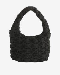 Schwarze, gesteppte Handtasche mit gepolstertem Griff und abnehmbaren Riemenclips, ausgestattet mit einem Reißverschluss oben und gerafftem Stoffdesign.