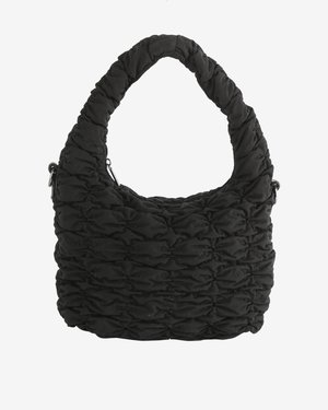 Black quilted handbag with padded handle and detachable strap clips, featuring a zippered top closure and ruched fabric texture.