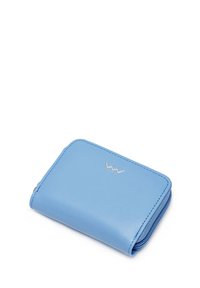 Blue leather wallet with a smooth texture, zip closure, and a silver logo accent on the front. Compact rectangular shape.
