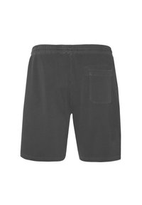 Shorts en mesh noirs avec une taille élastique et une poche arrière, conçus avec un tissu texturé et une longueur mi-thigh.