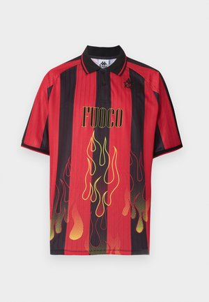 Red and black striped polo shirt with yellow and red flame graphics and "FUOCO" text, featuring Kappa logo on chest and collar.