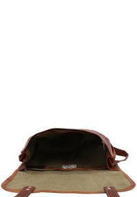 Sac en cuir marron avec un intérieur spacieux et non doublé. Doté d'une fermeture éclair, d'un fond plat et d'une bandoulière réglable.