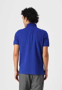 Tommy Hilfiger 1985 REGULAR  - Polo - wedge blue