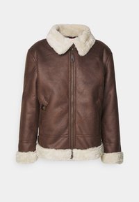 Giacca di pelle marrone con un morbido colletto e polsini in shearling bianco. Presenta una chiusura a zip frontale e una tasca laterale per praticità.