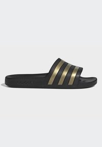 Black slide sandal with three gold stripes across the upper, textured black sole, and embossed logo on the side. Lightweight design.