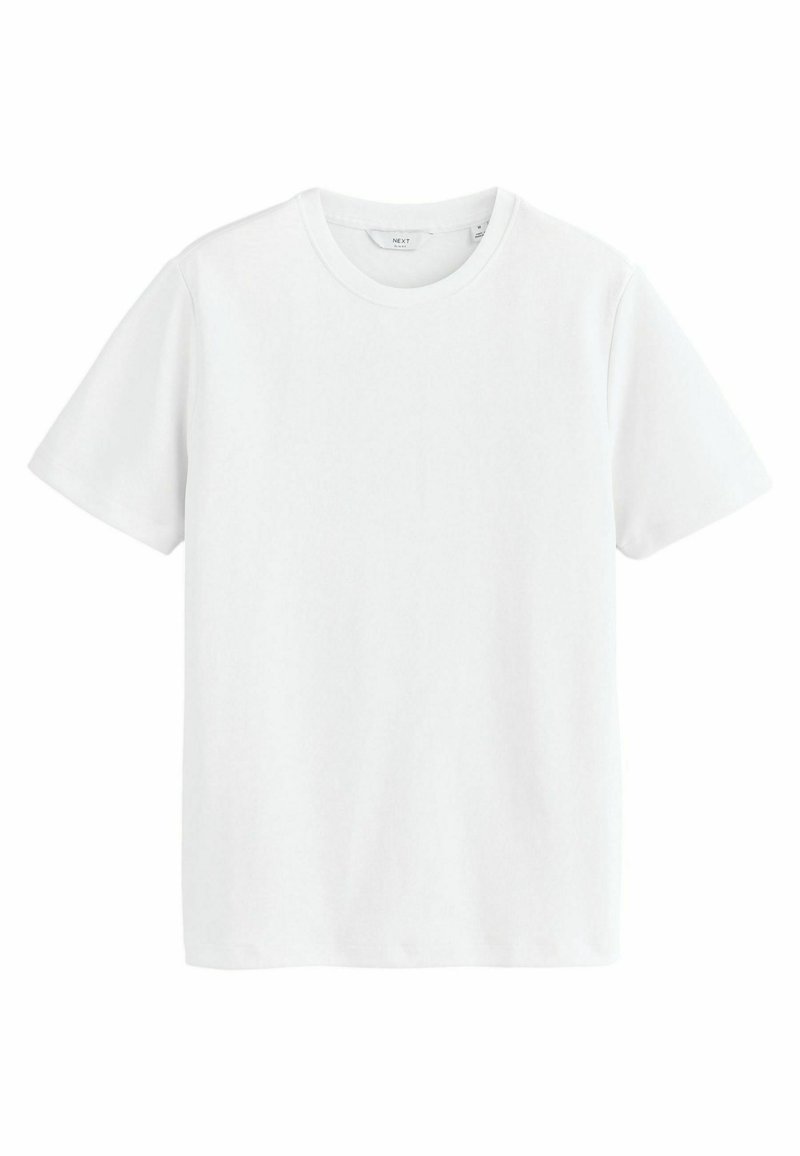 Camiseta blanca de algodón con mangas cortas, cuello redondo y un diseño sencillo. Textura suave, sin patrones ni acentos.