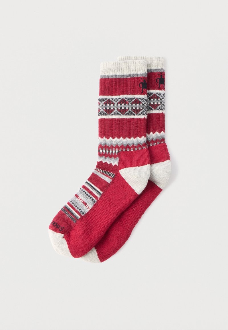 Red knit socks with white and grey patterns. Features stripes, geometric designs, and contrasting white toe and heel sections.