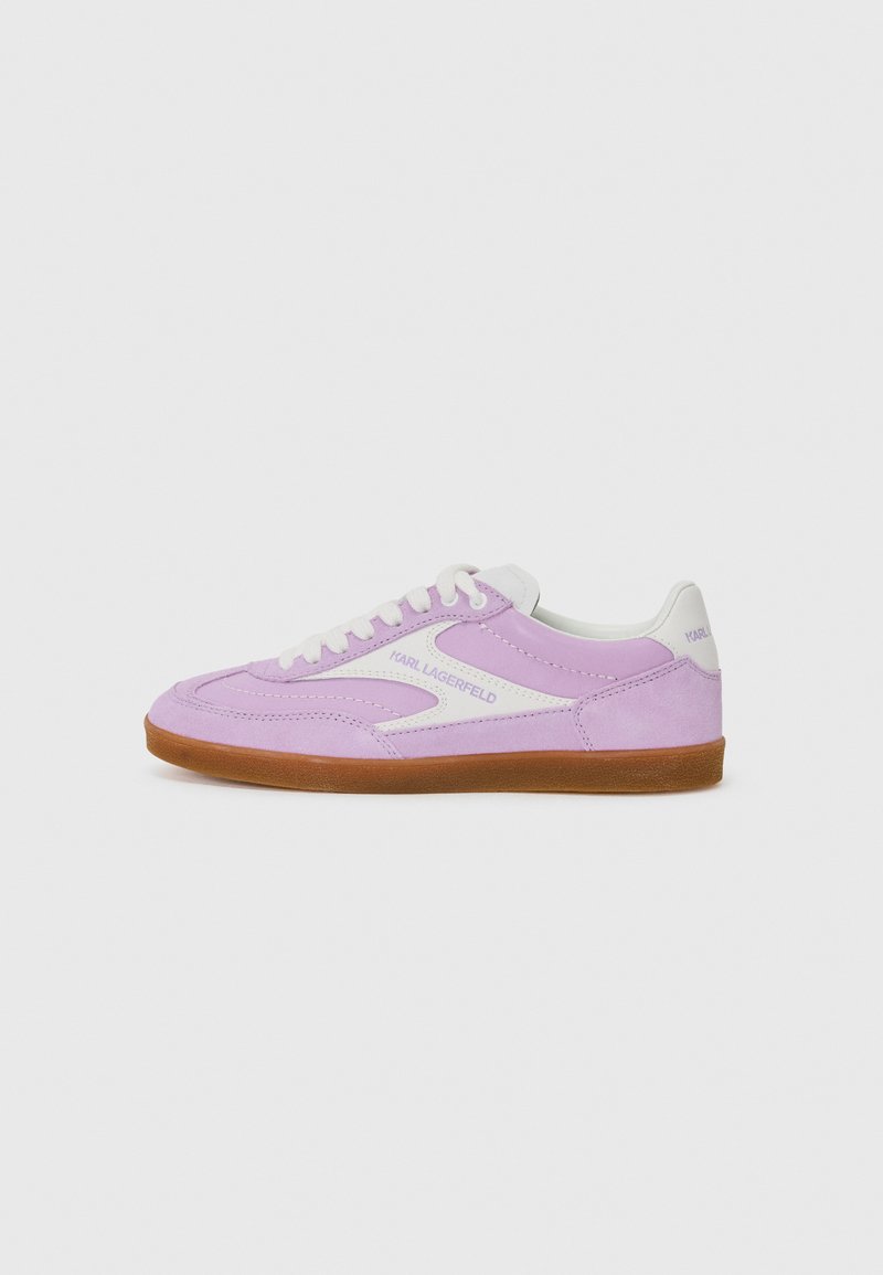 Purple suede sneakers with white accents, featuring a low-top design and a gum rubber sole. "Karl Lagerfeld" branding on the sides.
