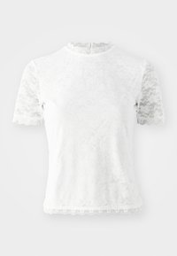 Hvit kortermet topp laget av blonde med blomsterdesign. Har høy hals og bølgete kanter på ermene og nederste kant. Bakåpning.