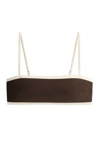 Haut style bandeau marron avec fines bretelles blanches réglables et bordure blanche le long des bords.