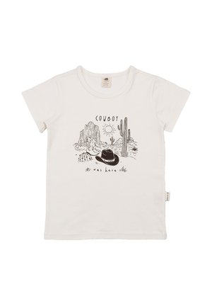 White short-sleeve t-shirt with a black line drawing of desert scenery, cactus, boots, cowboy hat, sun, and text "COWBOY was here."