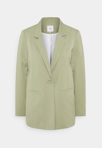 Blazer verde claro con un diseño estructurado, solapa, cierre de un solo botón y dos bolsillos frontales. Tejido texturizado con rayas verticales en el interior.