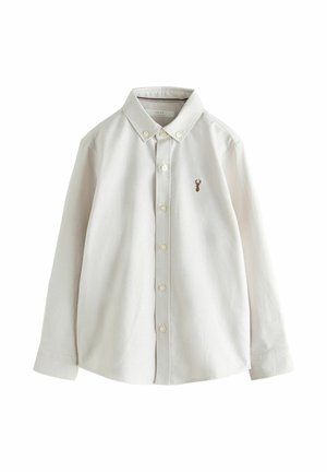 Long-sleeve white button-up shirt with a collar and small brown stag emblem on the left chest.